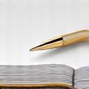 Documents and a pen on a desk, symbolizing preparation for a meeting.